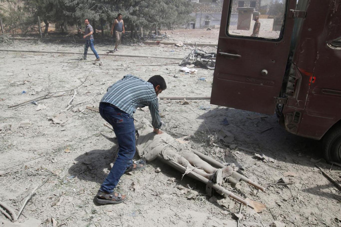 HRW Suriye'deki katliamları gözler önüne serdi HRW Suriye'deki katliamları gözler önüne serdi